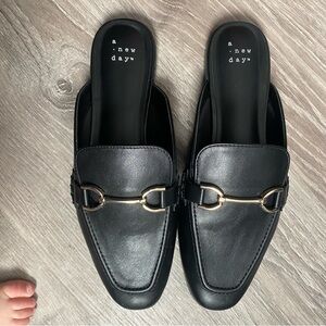 Women’s Flat Mule with gold buckle